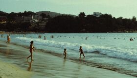 Tourists playing on the Beach in the Southern of Thailand